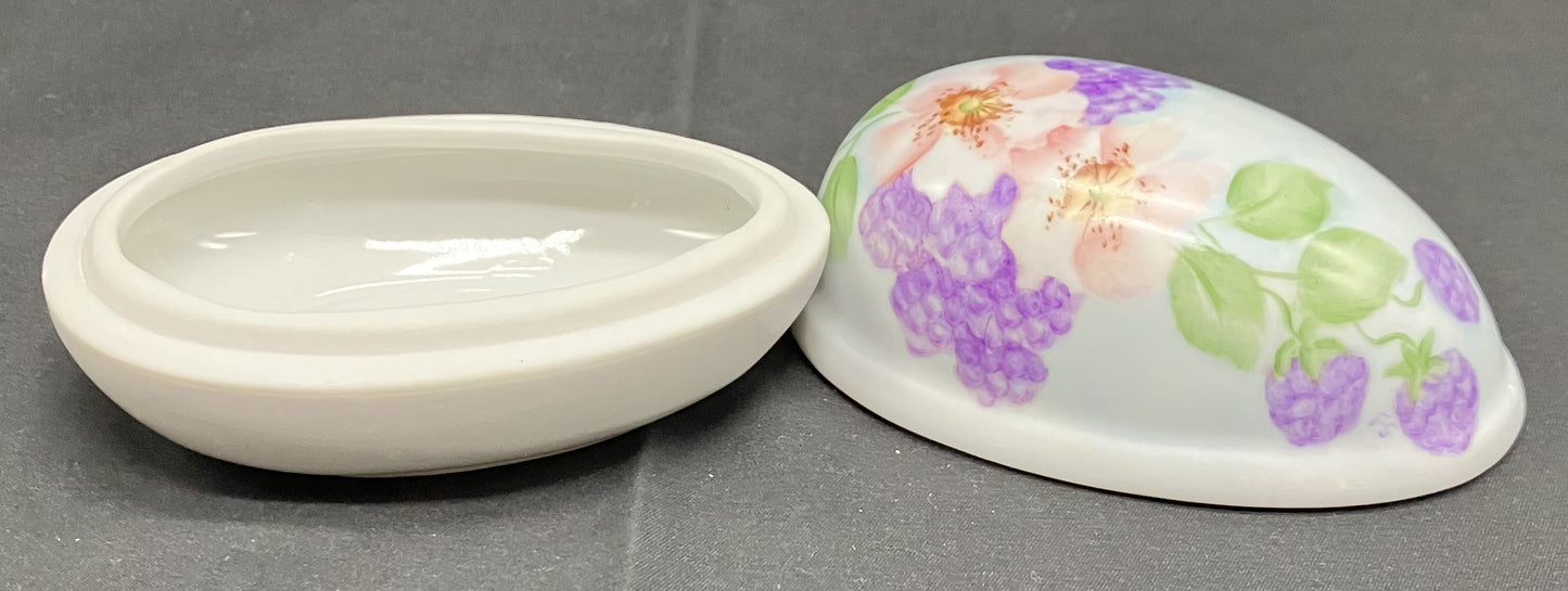 Egg shaped 2 piece ceramic trinket dish. White with floral decoration