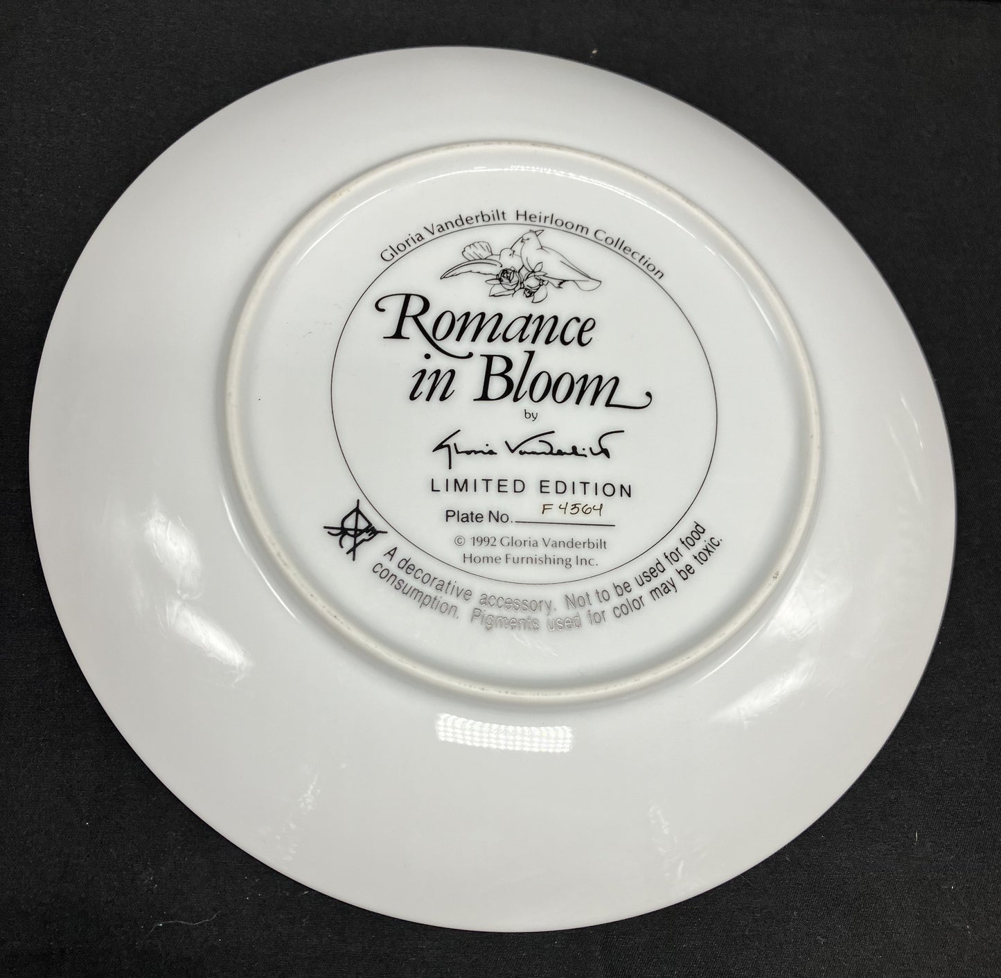 Romance in Bloom decorative plate by Gloria Vanderbilt