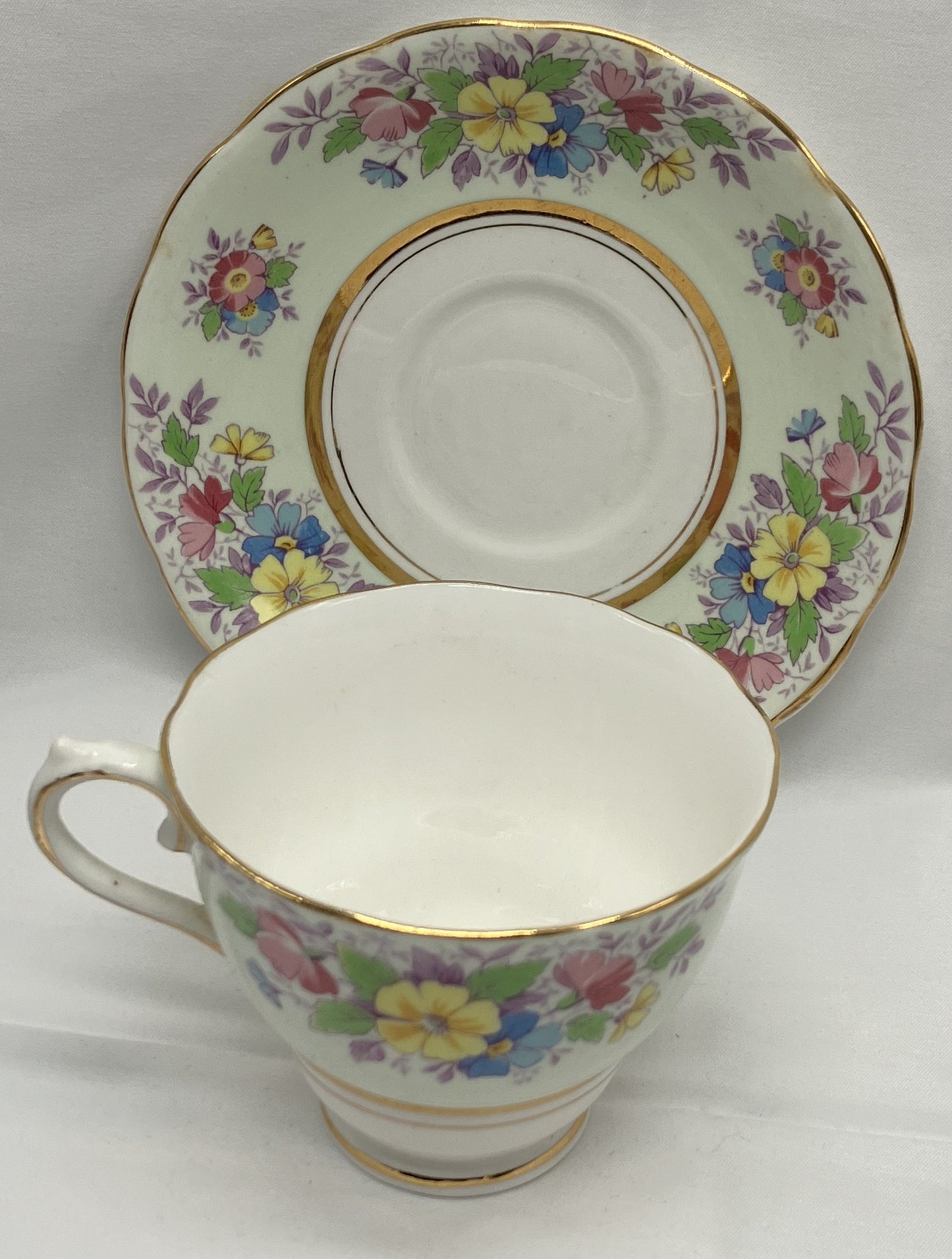 Antique "Floral" Teacup and Saucer, Bone China.