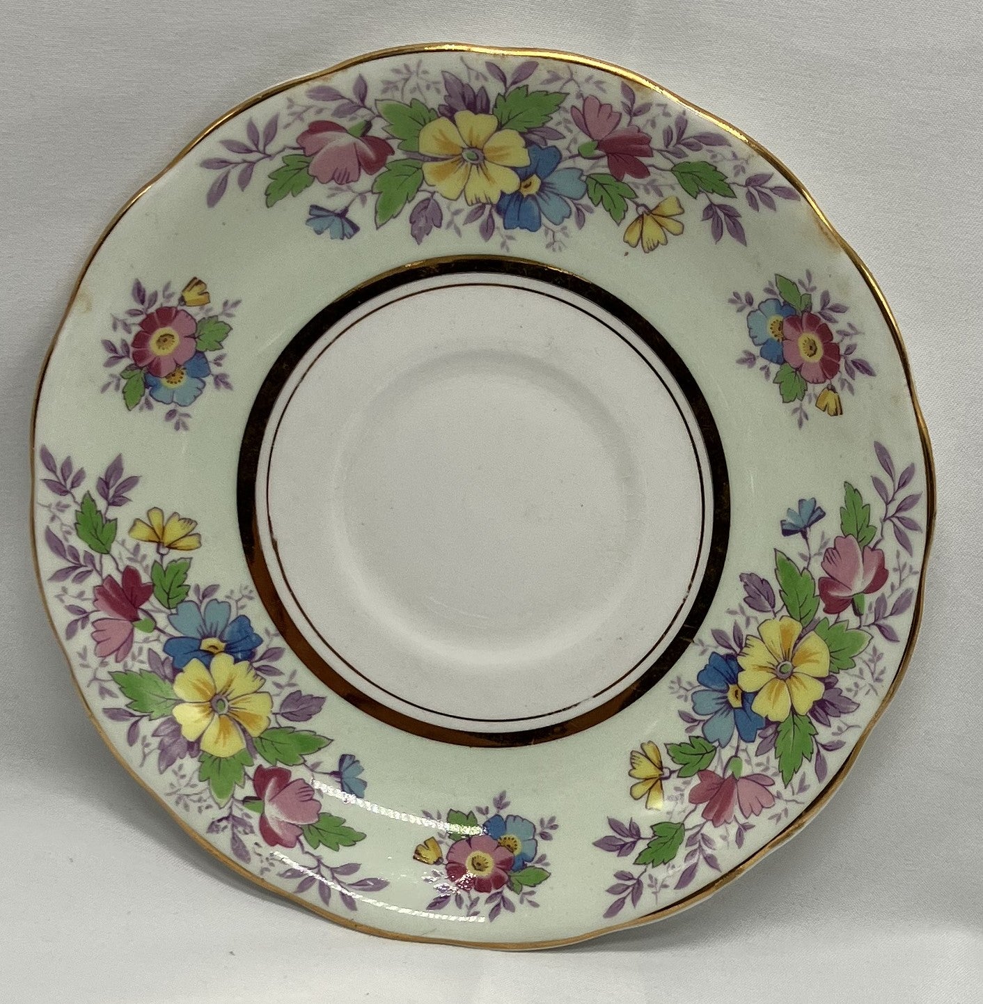 Antique "Floral" Teacup and Saucer, Bone China.