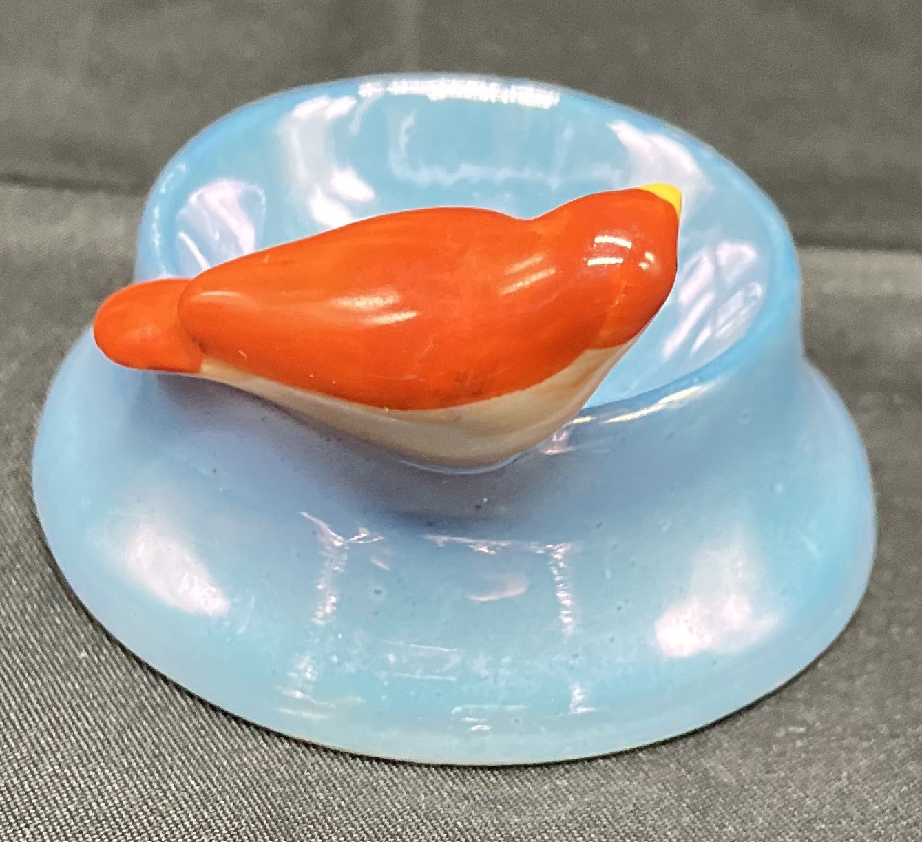 "Birdbath" Porcelain bird on rim of a salt dip dish, Vintage